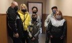 Wolontariusze Caritasu roznosili paczki