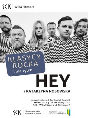 Połowę plakatu stanowi czarno-białe zdjęcie członków zespołu Hey. Poniżej czarne napisy z…