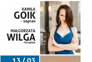 Plakat zapraszający na koncert operowo- operetkowy. Na zdjęciu ciemnowłosa kobieta w niebieskiej,…