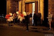 Biało-czerwone baloniki rozdawane siemianowiczanom pod kościołem pw. Krzyża Świętego.