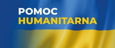 Na tle flagi napis "Pomoc humanitarna"