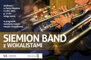 Na pierwszym planie informacje dotyczące koncertu Siemion Bandu. W tle zbliżenie na instrumenty…