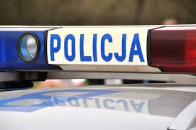 Tabliczka "Policja" na dachu samochodu
