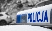 Napis "Policja" na radiowozie