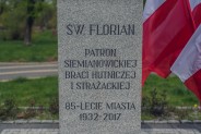 Treść napisu na cokole z figurą św. Floriana