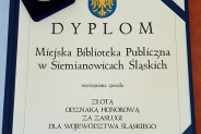Dyplom i odznaka dla Biblioteki